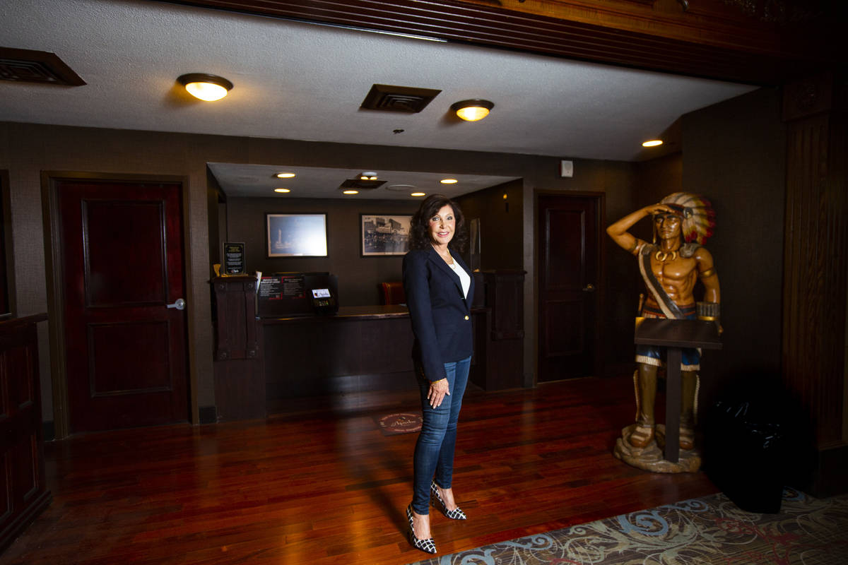Gina Silvagni Perry, the granddaughter of P.O. Silvagni, who opened Hotel Apache in 1932, stand ...