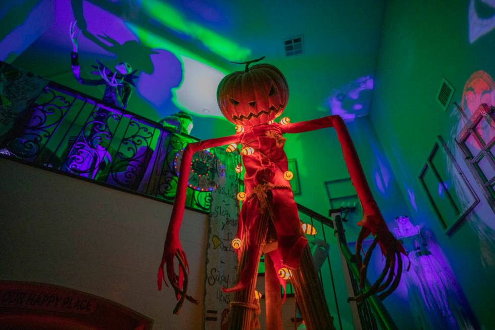 The entryway of the Garcia household is seen in the beginning stages of a Disney-themed Hallowe ...