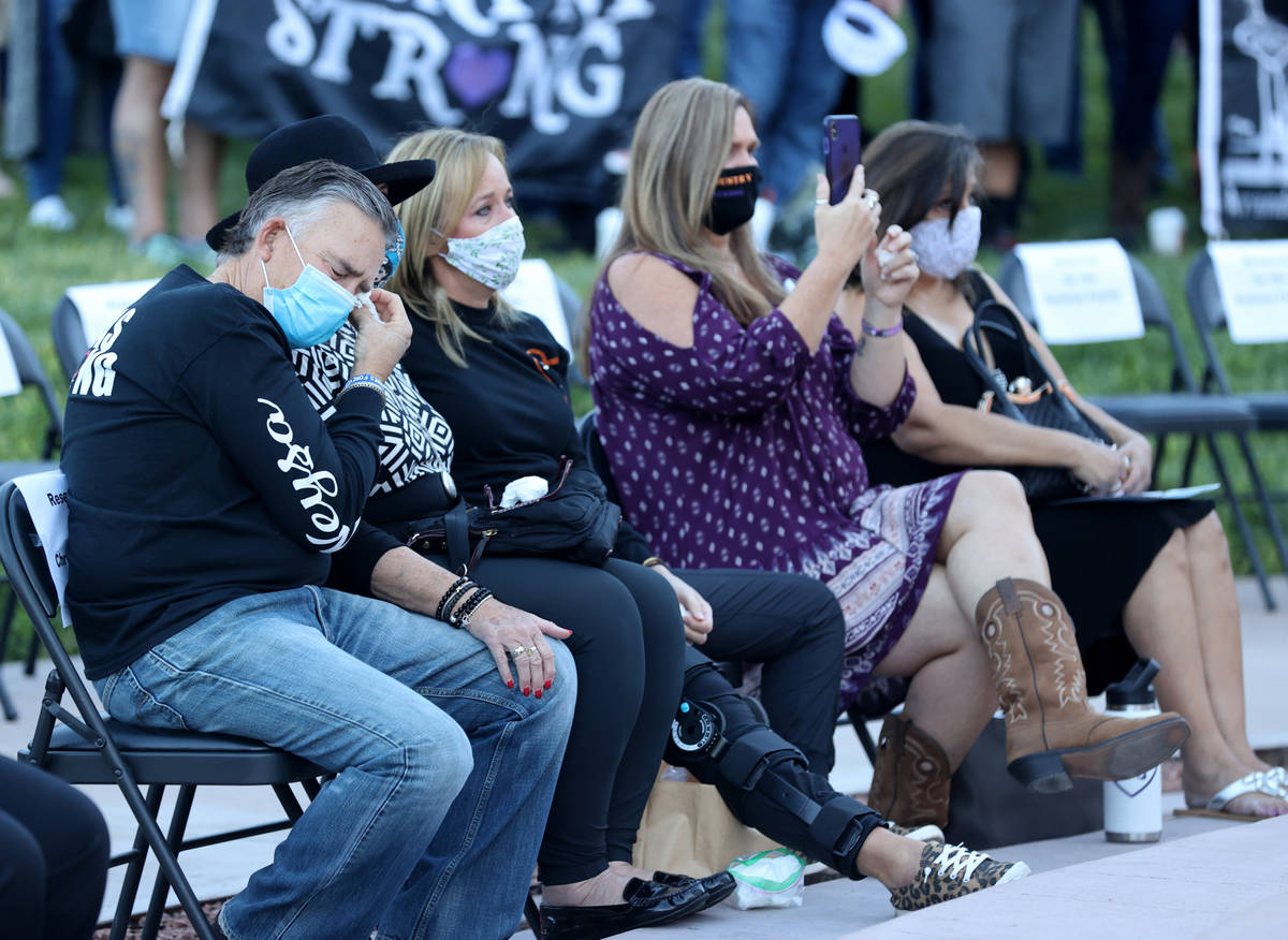 Chris Davis, right, of Las Vegas whose daughter Neysa Tonks was killed in the Route 91 Harvest ...