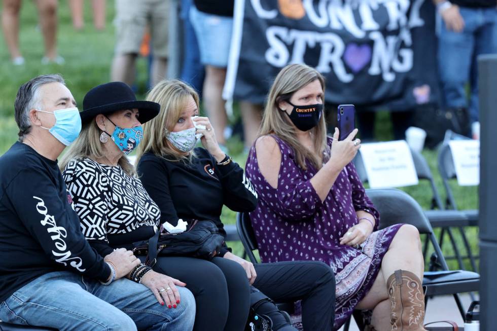 Chris Davis, left, of Las Vegas whose daughter Neysa Tonks was killed in the Route 91 Harvest f ...