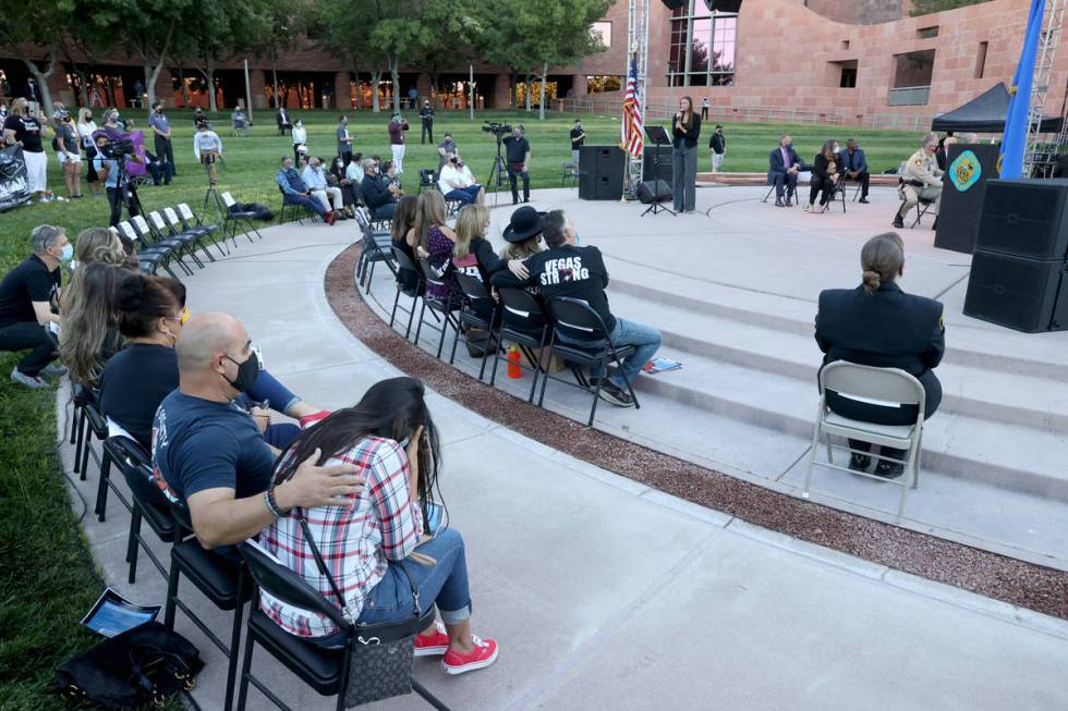 Survivors of the Route 91 Harvest festival shooting, Veronica McDaniel, right, is comforted by ...