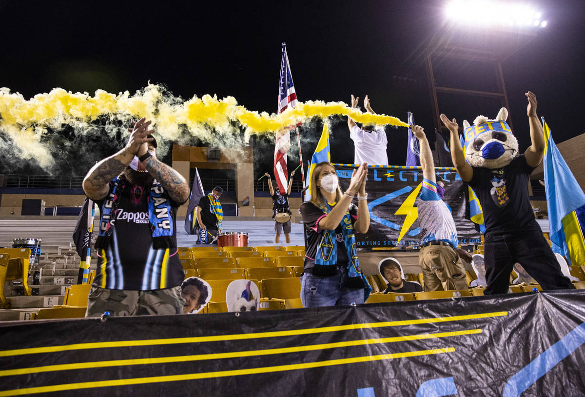 Las Vegas Lights FC fans cheer at the start of a USL Championship soccer game against Orange Co ...