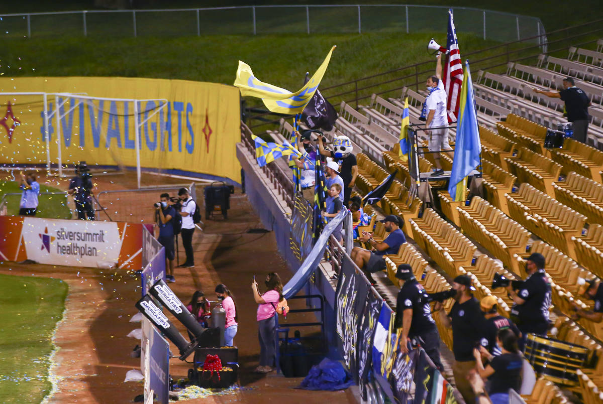 Las Vegas Lights FC fans cheer after a goal was scored during a USL Championship soccer game ag ...