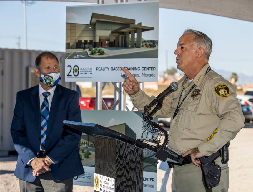 Sheriff Joseph Lombardo, right, thanks Greg Korte of The Korte Company for his construction exp ...