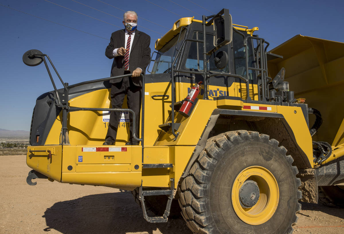 Governor Steve Sisolak jokingly asks for the keys to a dumpster during a press conference on th ...