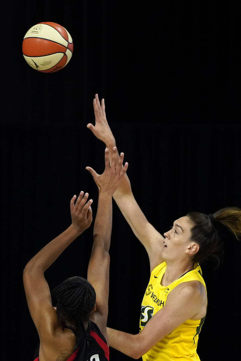 Seattle Storm forward Breanna Stewart (30) shoots over Las Vegas Aces guard Jackie Young during ...