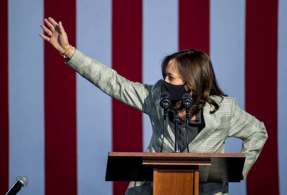 Democratic vice presidential nominee Kamala Harris waves to the crowd during a drive-in rally a ...