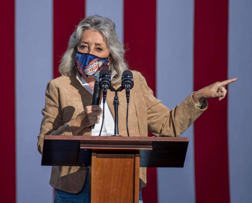 Rep. Dina Titus talks about Democratic vice presidential nominee Kamala Harris during a drive-i ...