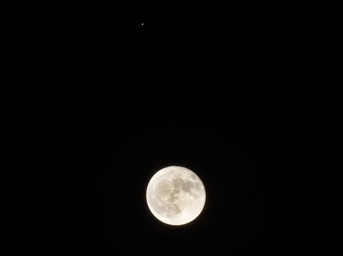 A glimpse of the moon and Mars (at top) seen above the Las Vegas Valley on Friday, Oct. 2, 2020 ...