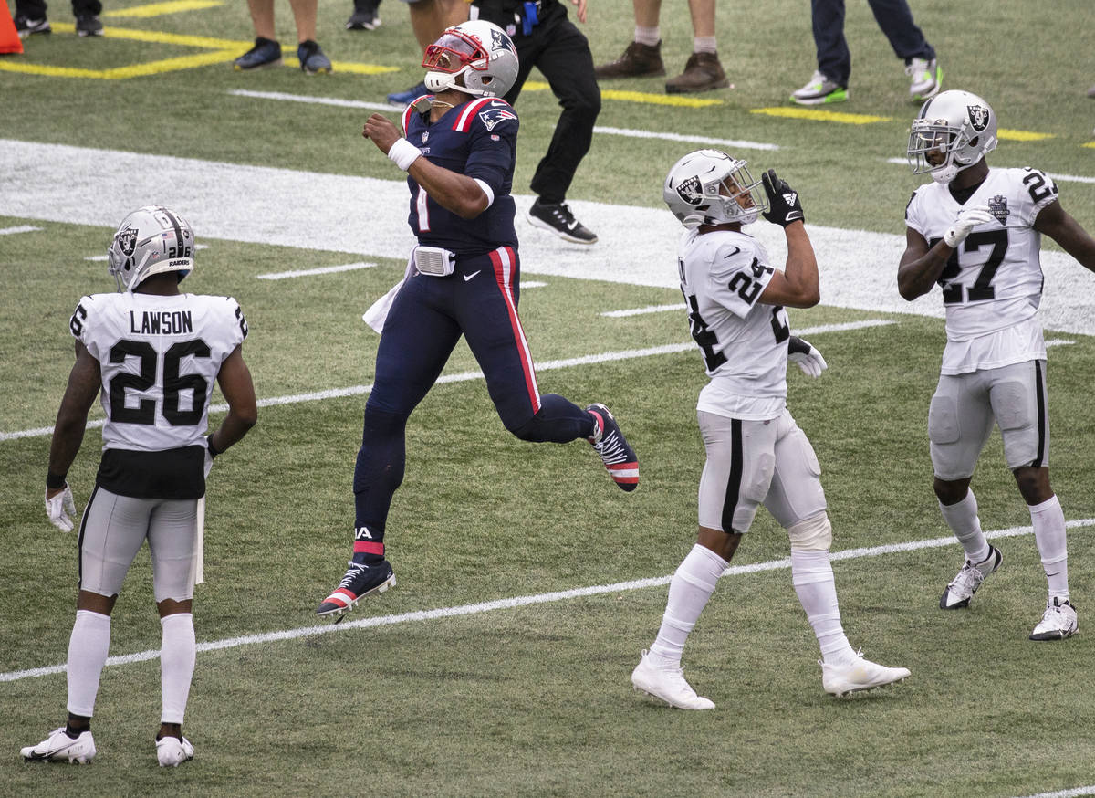 New England Patriots quarterback Cam Newton (1) celebrates a big run against Las Vegas Raiders ...