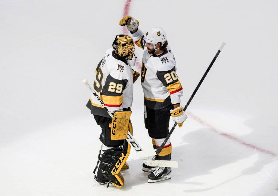 Vegas Golden Knights goalie Marc-Andre Fleury (29) and Chandler Stephenson (20) celebrate the t ...