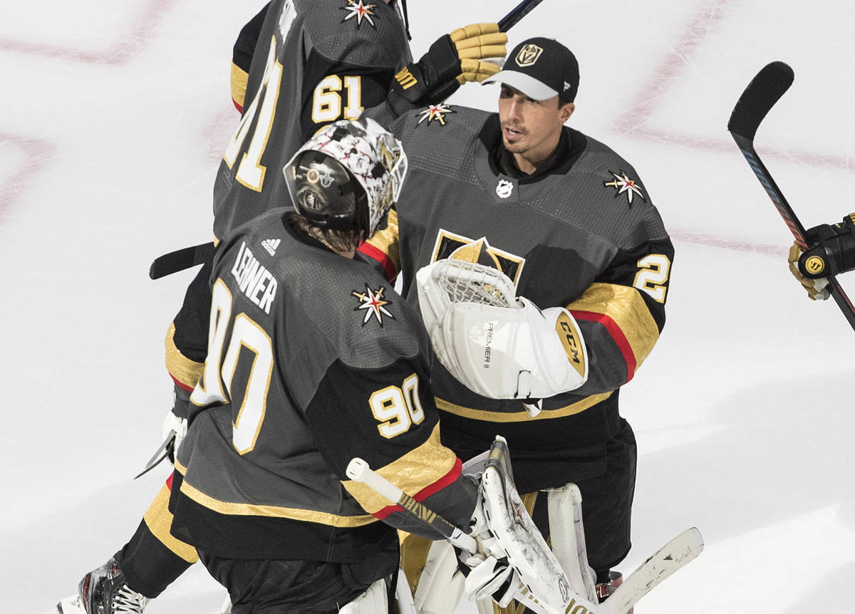 Vegas Golden Knights goalies Robin Lehner (90) and Marc-Andre Fleury (29) celebrate the team's ...