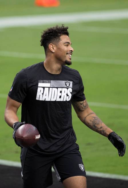 Las Vegas Raiders wide receiver Keelan Doss (18) warms up before the start of an NFL football g ...