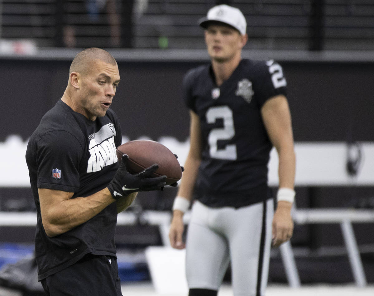 Las Vegas Raiders tight end Derek Carrier (85) warms up before the start of an NFL football gam ...