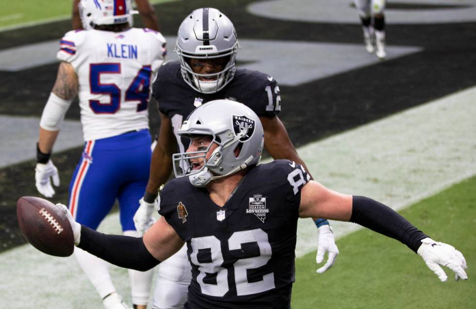 Las Vegas Raiders tight end Jason Witten (82) celebrates with Las Vegas Raiders wide receiver Z ...