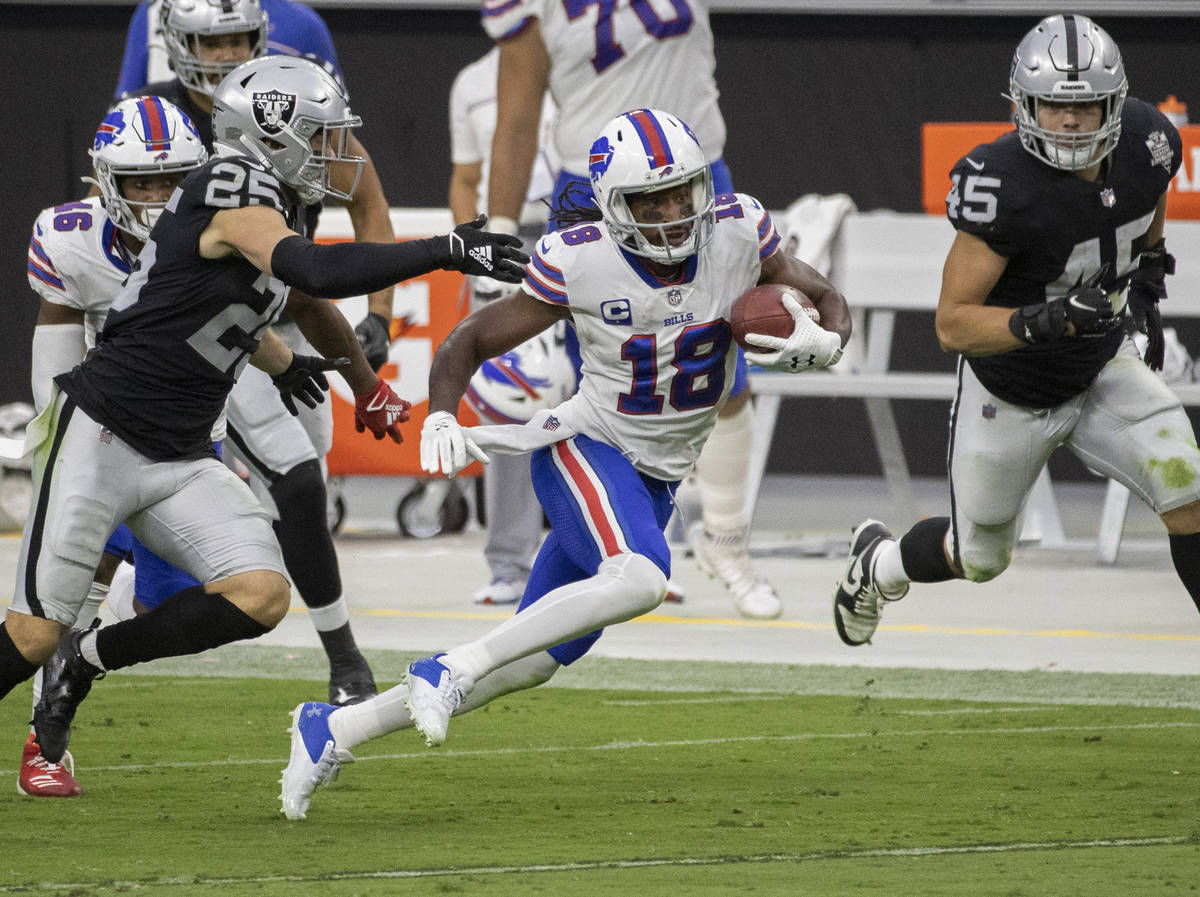 Buffalo Bills wide receiver Andre Roberts (18) streaks up field past Las Vegas Raiders free saf ...