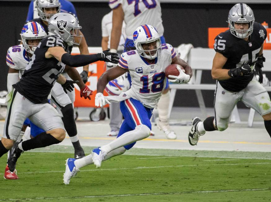 Buffalo Bills wide receiver Andre Roberts (18) streaks up field past Las Vegas Raiders free saf ...