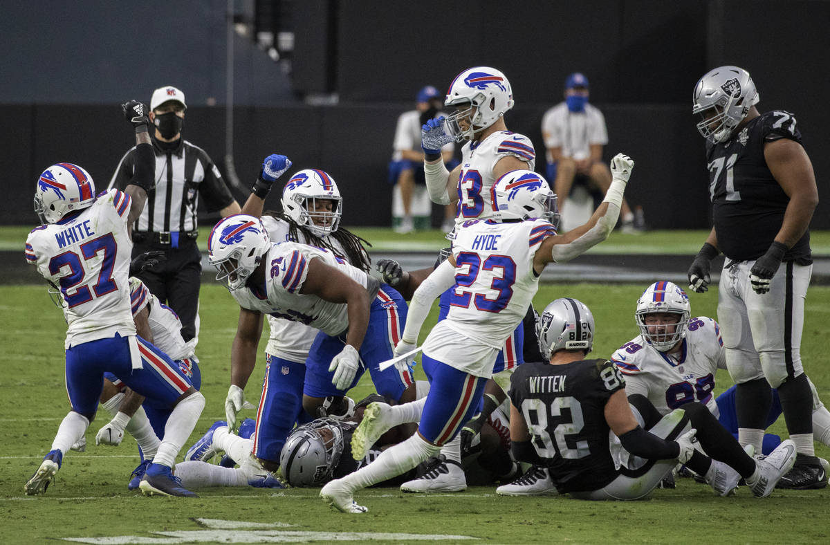 Buffalo Bills strong safety Micah Hyde (23), Buffalo Bills defensive tackle Ed Oliver (91) and ...