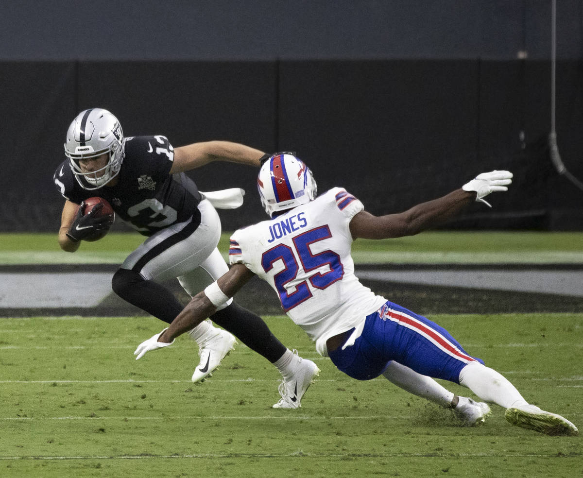 Las Vegas Raiders wide receiver Hunter Renfrow (13) cuts up field past Buffalo Bills running ba ...