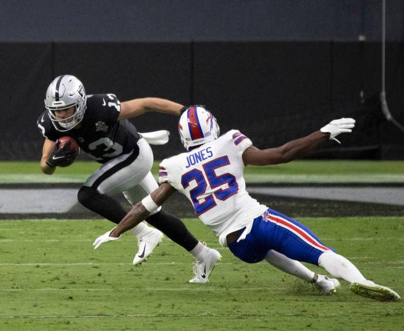 Las Vegas Raiders wide receiver Hunter Renfrow (13) cuts up field past Buffalo Bills running ba ...