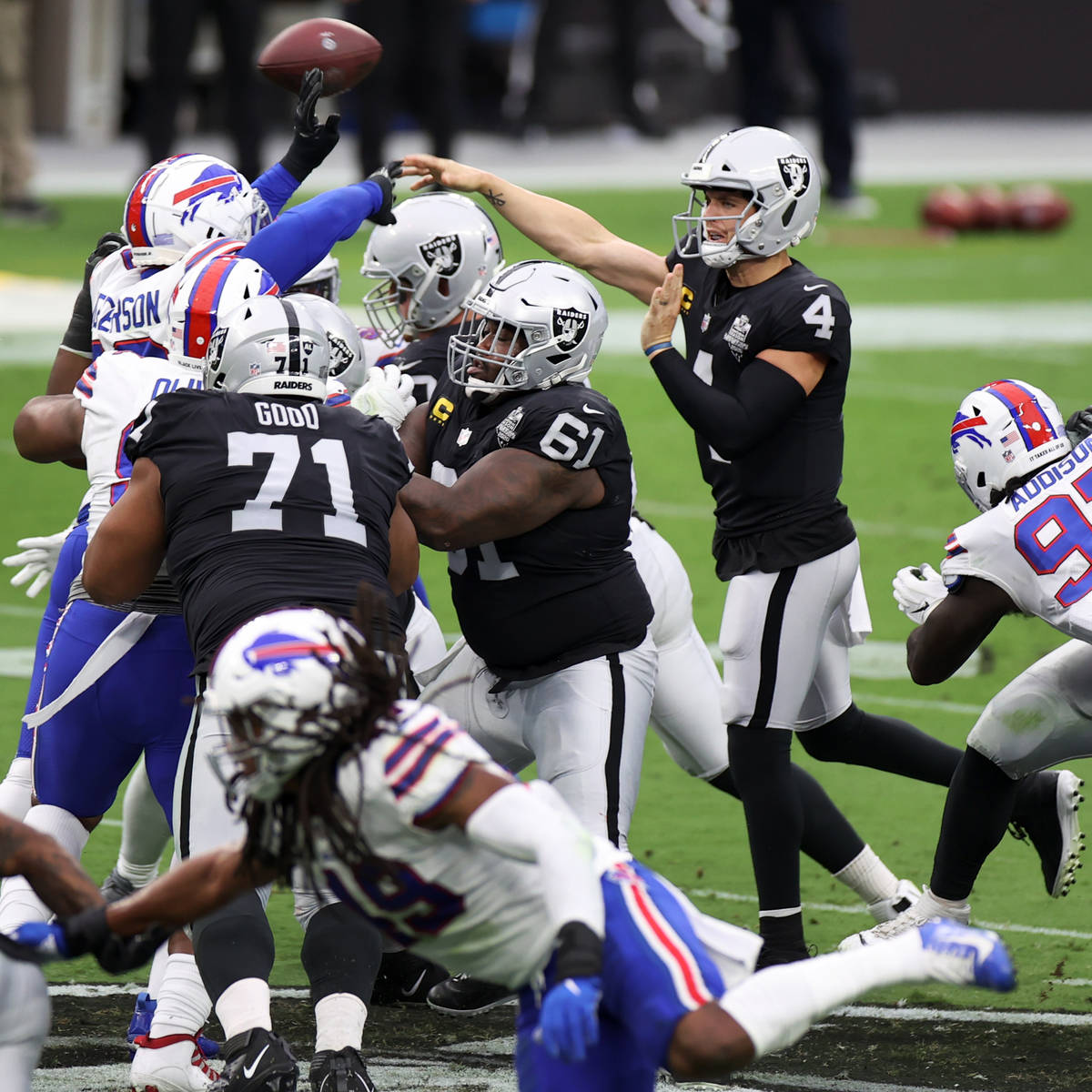 Las Vegas Raiders quarterback Derek Carr (4) throws a pass against the Buffalo Bills in the sec ...