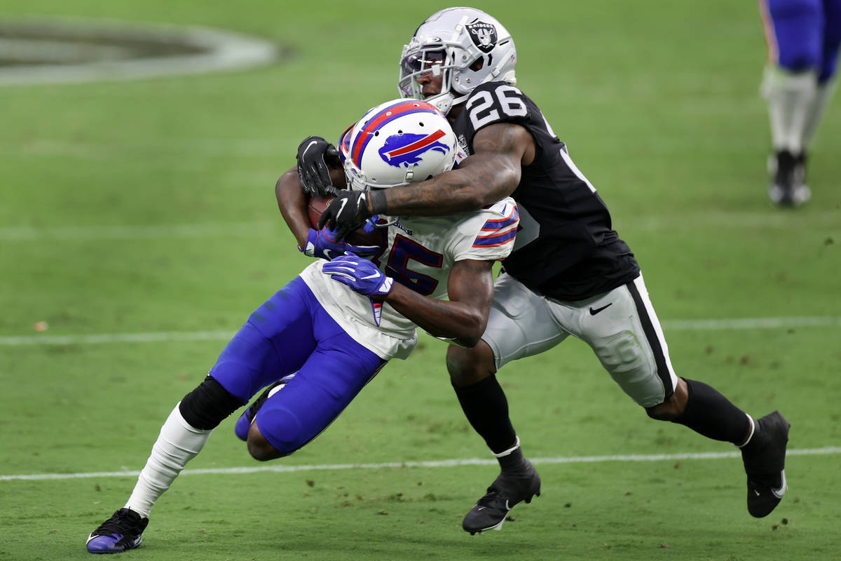 Buffalo Bills wide receiver John Brown (15) is tackled by Las Vegas Raiders cornerback Nevin La ...