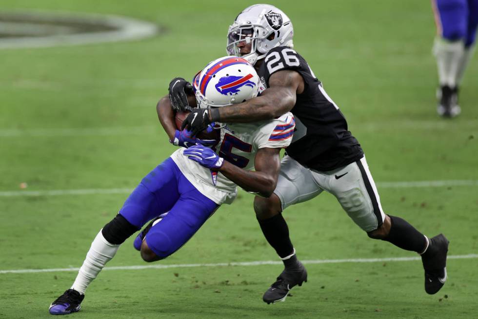 Buffalo Bills wide receiver John Brown (15) is tackled by Las Vegas Raiders cornerback Nevin La ...