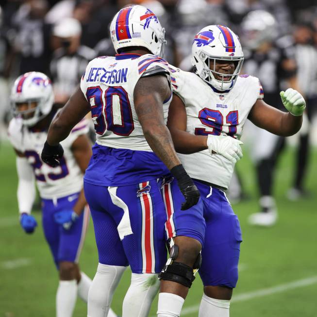 Buffalo Bills defensive tackle Ed Oliver (91) celebrates his tackle with Buffalo Bills defensiv ...