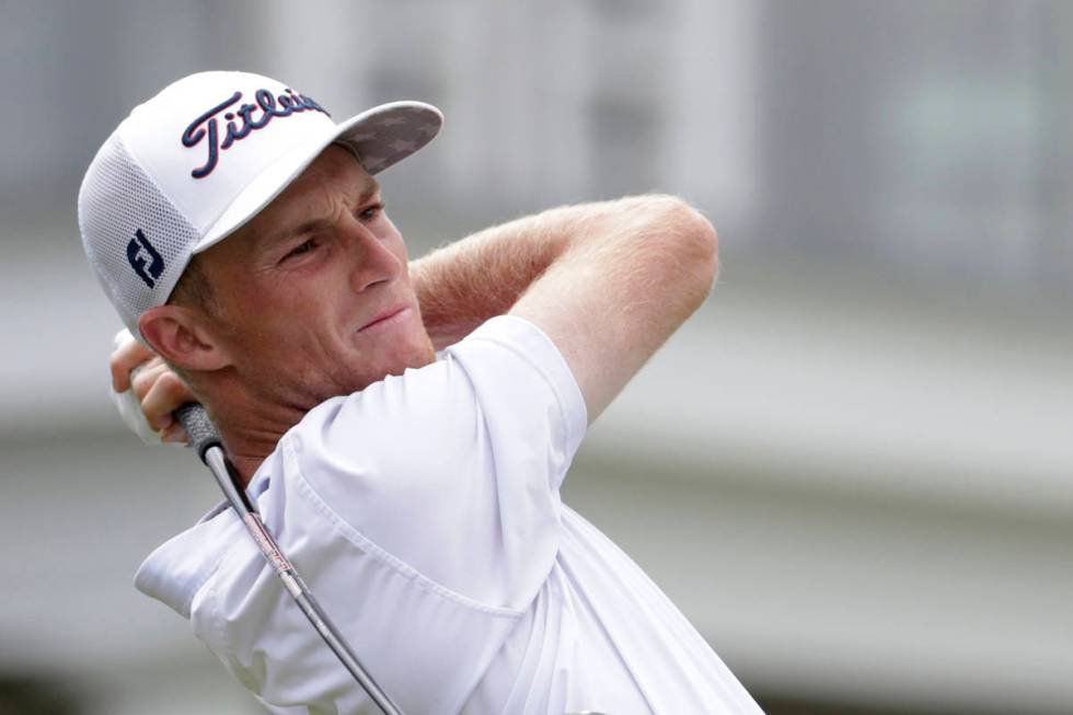 FILE- In this June 15, 2018, file photo, Will Zalatoris plays his shot from the 14th tee during ...