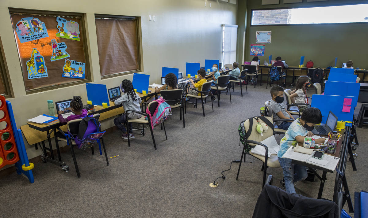 First and second graders work independently at their desks as they do classwork in the Vegas St ...