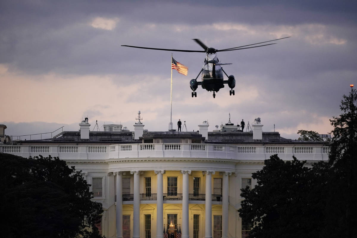 President Donald Trump arrives back at the White House aboard Marine One, Monday evening, Oct. ...