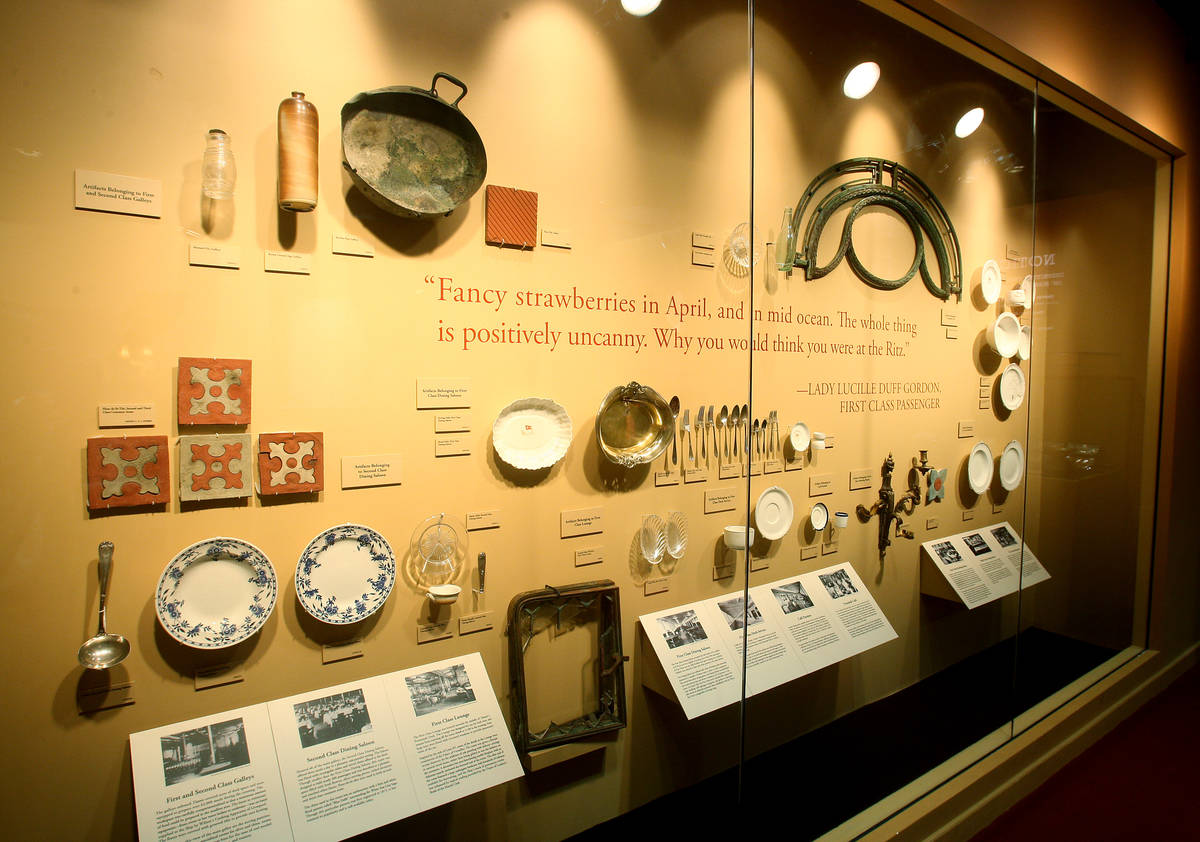 A wall of serving utensils, dishes and tiles are shown at "Titanic: The Artifact Exhibition" at ...
