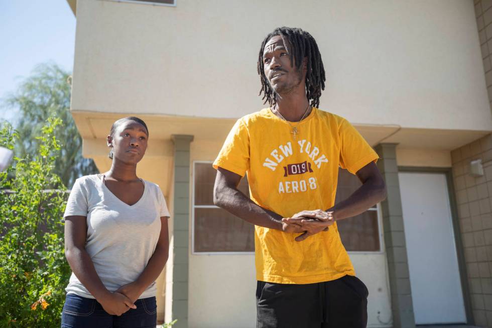 Alaijzha Shields, 14, left, and Darius Jones, 26, outside of their home on Oct, 6, 2020, give t ...