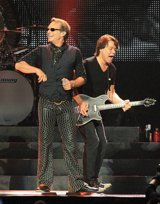 Lead singer David Lee Roth, left, and guitarist Eddie Van Halen of Van Halen perform at the MGM ...
