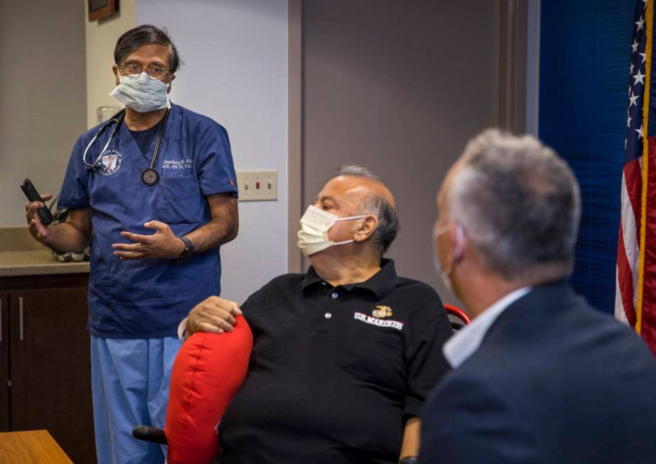 (From left) Dr. Chowdhury Ahsan talks about patient Pablo Bernabe with University Medical Cente ...
