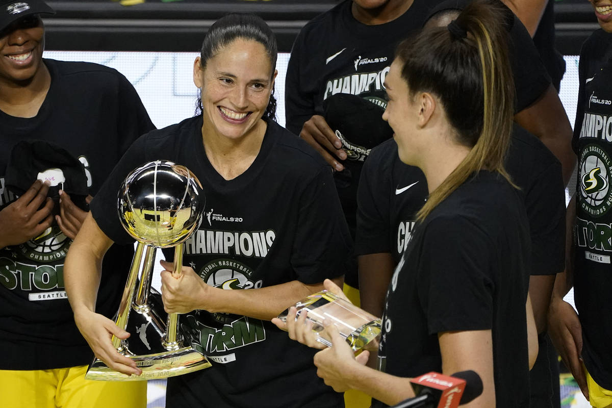 Seattle Storm guard Sue Bird, left, smiles at Breanna Stewart after the team defeated the Las V ...