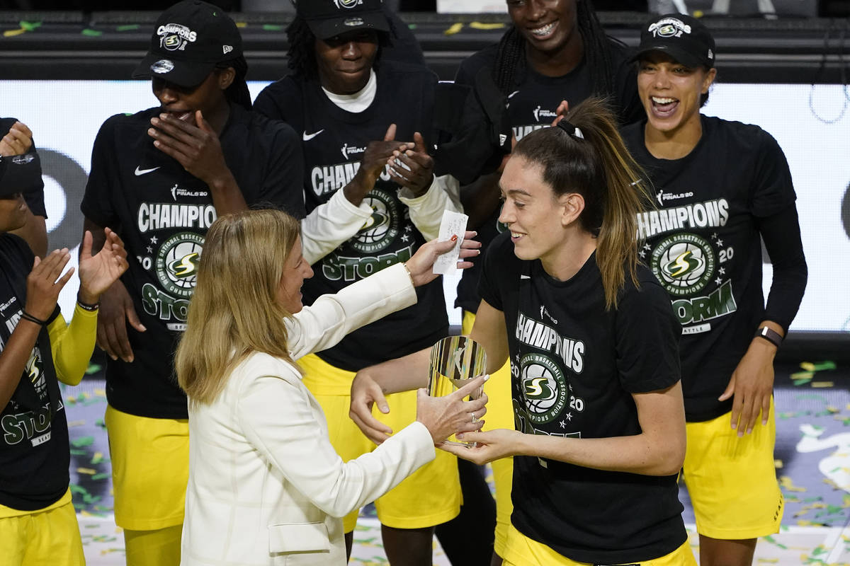 Seattle Storm forward Breanna Stewart, right, hugs WNBA Commissioner Cathy Engelbert after she ...