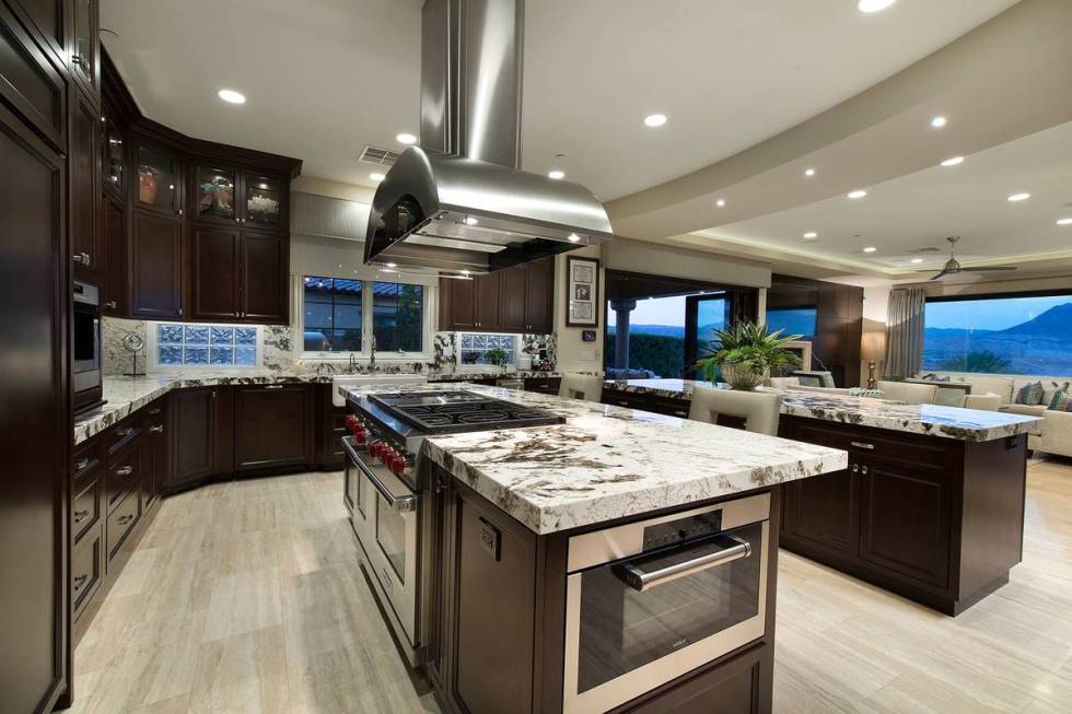 The kitchen has upgraded appliances. (Synergy Sotheby’s International Realty)