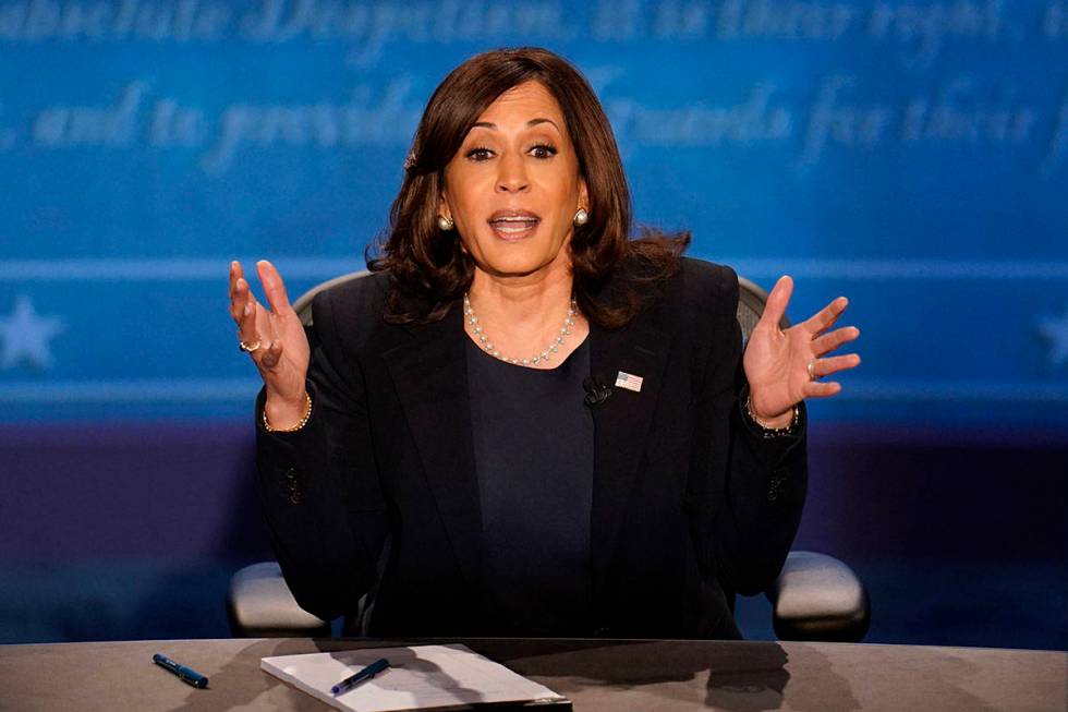 Democratic vice presidential candidate Sen. Kamala Harris, D-Calif., responds to a question dur ...