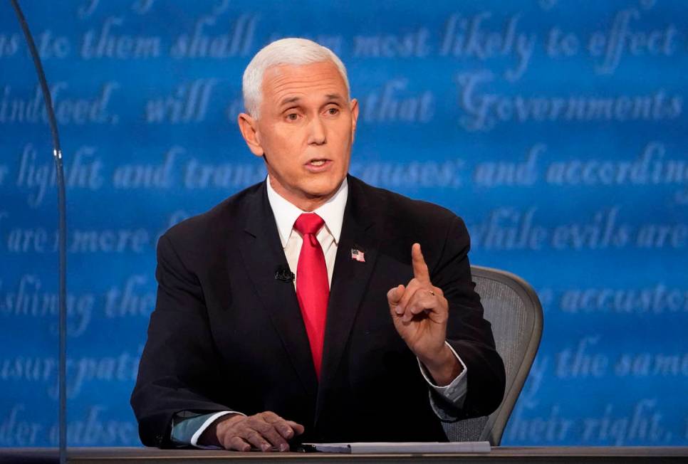 Vice President Mike Pence makes a point during the vice presidential debate with Democratic vic ...