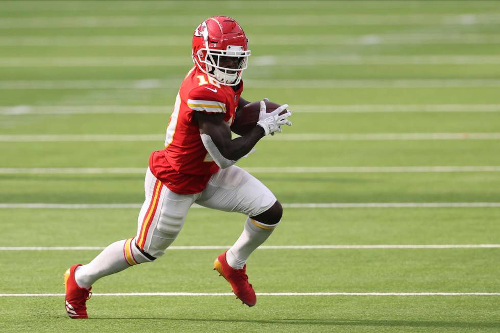 Kansas City Chiefs wide receiver Tyreek Hill (10) runs after the catch during an NFL football g ...