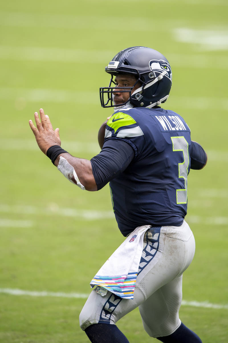 Seattle Seahawks quarterback Russell Wilson (3) throws the ball against the Miami Dolphins duri ...