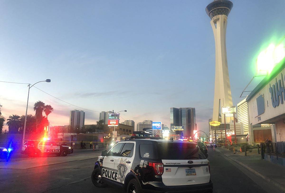 Las Vegas police at the scene of a shooting near the Oasis Motel on Las Vegas Boulevard on Frid ...