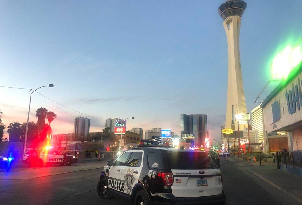 Las Vegas police at the scene of a shooting near the Oasis Motel on Las Vegas Boulevard on Frid ...