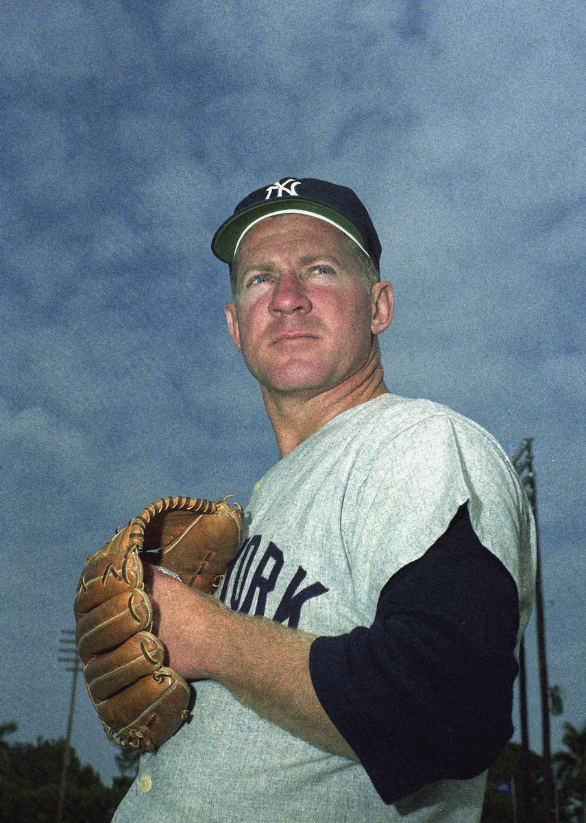 FILE - This March 1960 file photo shows New York Yankee pitcher Whitey Ford. A family member te ...