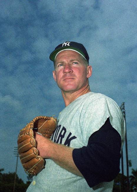 FILE - This March 1960 file photo shows New York Yankee pitcher Whitey Ford. A family member te ...