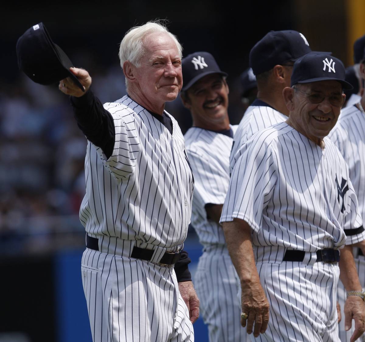 FILE - In this July 7, 2007 file photo, former New York Yankees pitcher, Whitey Ford, left, ack ...