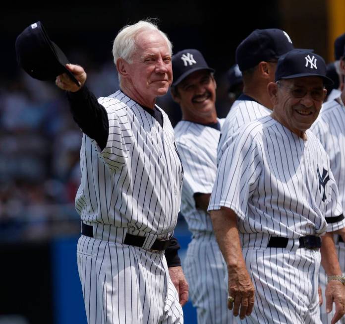 FILE - In this July 7, 2007 file photo, former New York Yankees pitcher, Whitey Ford, left, ack ...