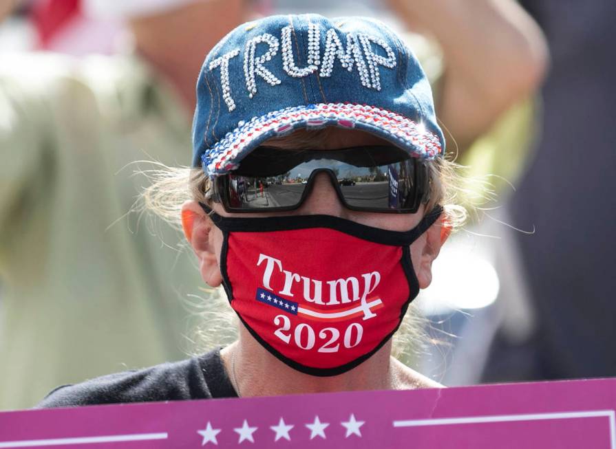 President TrumpÕs supporter Linda Pocaroba protests outside of Southeast Career Technical ...