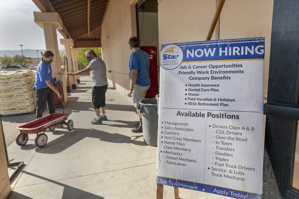 A now hiring sign is seen at the entrance of Star Nursery on W Tropicana Ave.,Thursday, Oct. 8, ...